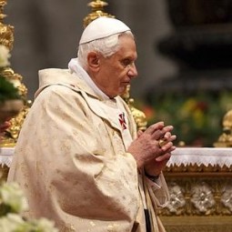 Pope Benedict XVI arrives to lead a Christmas mass in Saint Peter's Basilica at the Vatican