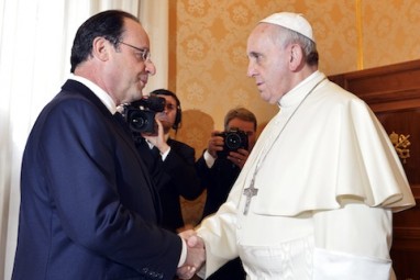 Pope Francis greets French President Francois Hollande during private audience at Vatican