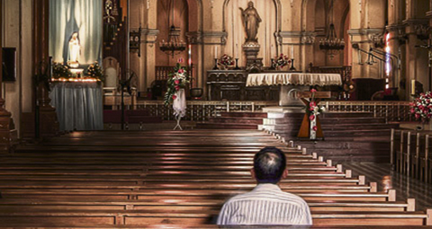 9-MAN-PRAYING-IN-CHURCH