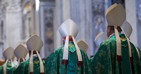 Bishops arrive in procession for Mass celebrated by Pope Francis to open extraordinary Synod of Bishops on the family