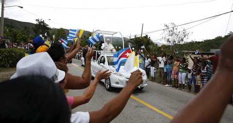 People cheer as Pope Francis drives past in his popemobile in El Cobre, Cuba, Sept. 21. (CNS photo/Carlos Garcia Rawlins, Reuters)