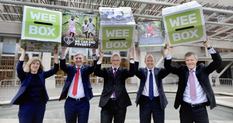FREE PICTURE:  Scottish Parliament’s Leading Politicians Back Sciaf Wee Box Appeal, Thurs 21/03/2019:
  Deputy First Minister John Swinney, Scottish Liberal Democrat leader Willie Rennie, Scottish Labour leader Richard Leonard, co-leader of the Scottish Greens parliamentary group Alison Johnstone and senior Conservative MSP Donald Cameron today (Thursday 21st March 2019) posed with giant WEE BOXES outside the Scottish Parliament, Edinburgh, as they gave their backing to the charity’s life-changing work around the world’s poorest countries.
 This year’s WEE BOX appeal tells the story of how SCIAF is helping vulnerable young people in Uganda affected by poverty, HIV and AIDS, and the legacy of war to grow food and earn a living so they can support themselves and their families. 
Pictured left to right are: Alison Johnstone MSP, Richard Leonard MSP, John Swinney MSP, Donald Cameron MSP and Willie Rennie MSP.
 More information from: Laura Hamilton, Sciaf press officer - 0141 354 5555 - 07914 408 589 - lhamilton@sciaf.org.uk 
 Photography for Sciaf from: Colin Hattersley Photography - www.colinhattersley.com - cphattersley@gmail.com - 07974 957 388.