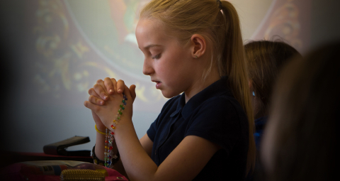 SCHOOLCHILD PRAYING (3)